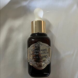 Nina's Paris Original Jardin D'Epices Serum empty container